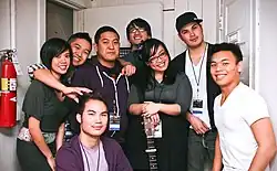 Photograph of Filipino American musicians – six men and two women