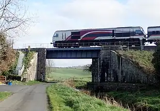 NIR 201 Class Loco 8208 heading the ex Dublin Connolly Enterprise south of Poyntzpass 2019