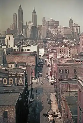 View of various buildings in Manhattan in 1938. 70 Pine Street is the second-leftmost building in the background.