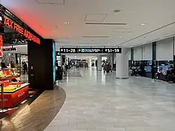 A corridor located in a concourse of Terminal 1