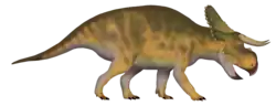 Digital rendering of a brown, quadrupedal dinosaur with long horns