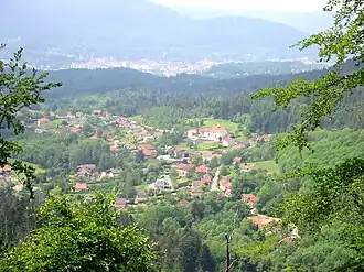 View of Nayemont-les-Fosses, with Saint-Dié-des-Vosges in the background