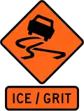 Slippery road surface due to ice or grit