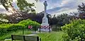 Newmachar War Memorial with poppy wreath