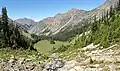 North Petunia Peak (right of center) seen from Royal Basin. Petunia Peak in upper right corner of frame.