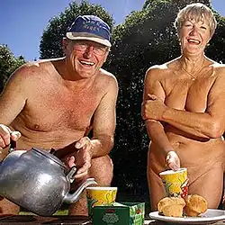 Image 8A publicity photo showing a North American naturist couple making tea (from Naturism)