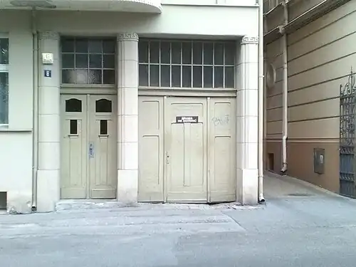 Adorned entrance doors