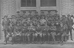 Formal group portrait of men in Army uniform
