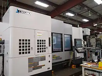 An Okuma MULTUS U3000 multi-tasking machine with automatic tool changer at Lampin Corporation in the Blackstone Valley of Massachusetts.