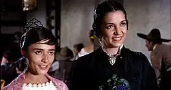 Black and white film still from One-Eyed Jacks showing Katy Jurado with Pina Pellicer