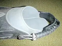 Open heel fin with stainless steel spring strap with rubber padding