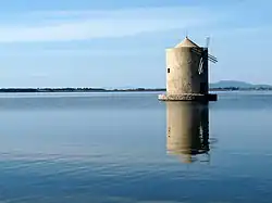 The windmill on the lagoon of Orbetello.