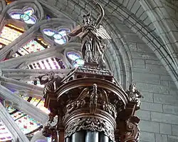 Organ decorated with figures playing a wooden flute and violin