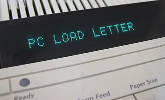 "PC LOAD LETTER" in a printer console's LED display.