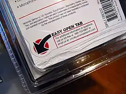 A ridged plastic clamshell package with a label reading "Easy Open Tab"
