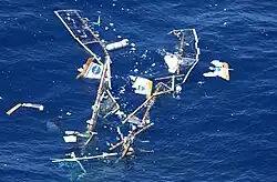 Wreckage falling in to the water