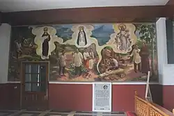 Painting inside the church depicting the story of the three miraculous images from Buhi