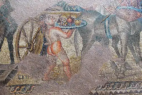 Triumph of Dionysos - Satyr Skirtos offering fruit to Dionysos