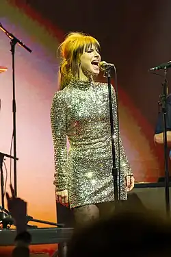 Picture of Hayley Williams singing on a mic