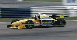 Pedro Diniz driving the FG01 at the 1995 British Grand Prix.