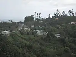 Homes perched on mountainside on PR-155 in Perchas
