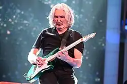 Palmer performing on stage