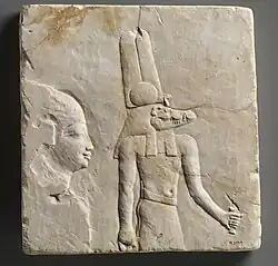 Plaque with head and shoulders of a priestly figure and Sobek; 400-30 BCE; limestone; height: 27.5 cm, width: 25.5 cm; Metropolitan Museum of Art (New York City)