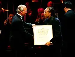 Gilberto Gil – the winner in the contemporary category in 2005, receives the prize from King Carl XVI Gustaf of Sweden