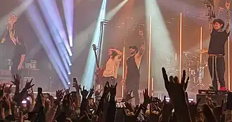 Polyphia performing in 2023