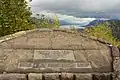The main memorial stone with the names of Portland Women's Forum Life Members and arrows and names of various features visible from the point.