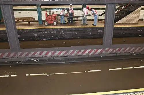 Flooding at 125th Street after a water main break
