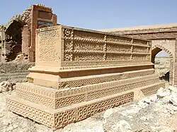 Quranic artwork at a decorated grave of a Sufi saint in the necropolis