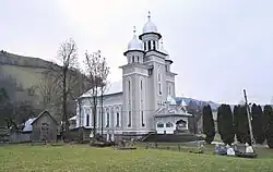 Stone church in Poienile de sub Munte