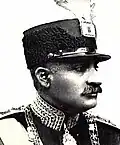 Reza Shah Pahalvi wearing a Pahlavi Hat decorated by a Jeghe at the top