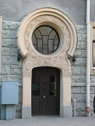 National Romantic Art Nouveau: Detail with typical National Romantic decoration on a house built in 1908 by Konstantīns Pēkšēns.[35]