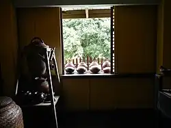 The banggéra at the Rizal Shrine in Calamba, here used for drying palayoks, traditional earthenware pots used for cooking