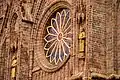 Rose window and statues of saints