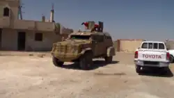 SDF MRAP and pickup truck in Raqqa, 8 June 2017
