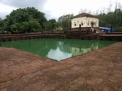 Safa Masjid adjacent to which, on the south, is a masonry tank measuring 30 by 30 m (98 by 98 ft), with Mihrab designs