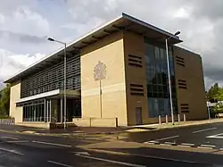 Street view of a modern square, beige building