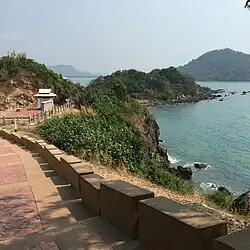 View of the cliff and the sea seen from Noen Nang Phaya, a scenic viewpoint of Chaloem Burapha Chonlathit Road, Sanam Chai, Na Yai Am