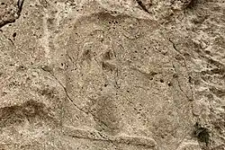 Sar-e Pol-e Zahab, relief IV. Beardless warrior trampling a foe, facing a goddess.[17]