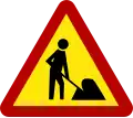 Workers in road ahead