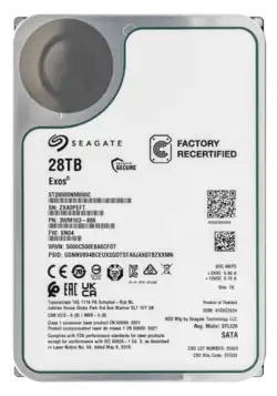 Front of hard disk with white sticker and black text. Top left a darker circle area