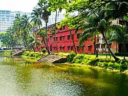 Dr. Muhammad Shahidullah Hall, three-storied main building at the west side of the pond