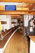 The forecastle of Sherman Zwicker, a wooden auxiliary schooner moored at the Maine Maritime Museum in Bath, Maine, USA
