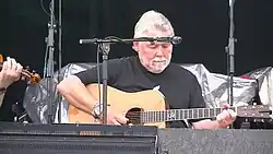 Simon Nicol performing at Fairport's Cropredy Convention 2014