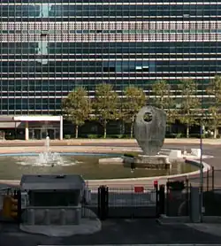 Single Form by Barbara Hepworth is displayed in the pool in front of the Secretariat Building