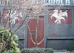 Sculpted plaques by Malvina Hoffman