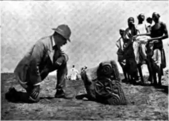 Old photo of a man looking at a capital